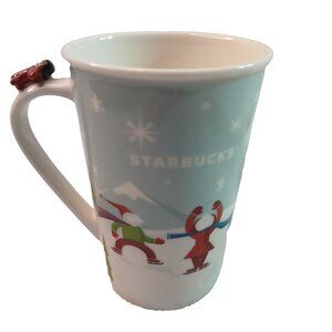 Starbucks 2011 Christmas Winter Coffee Mug Cup Skaters Sledding Red Airplane